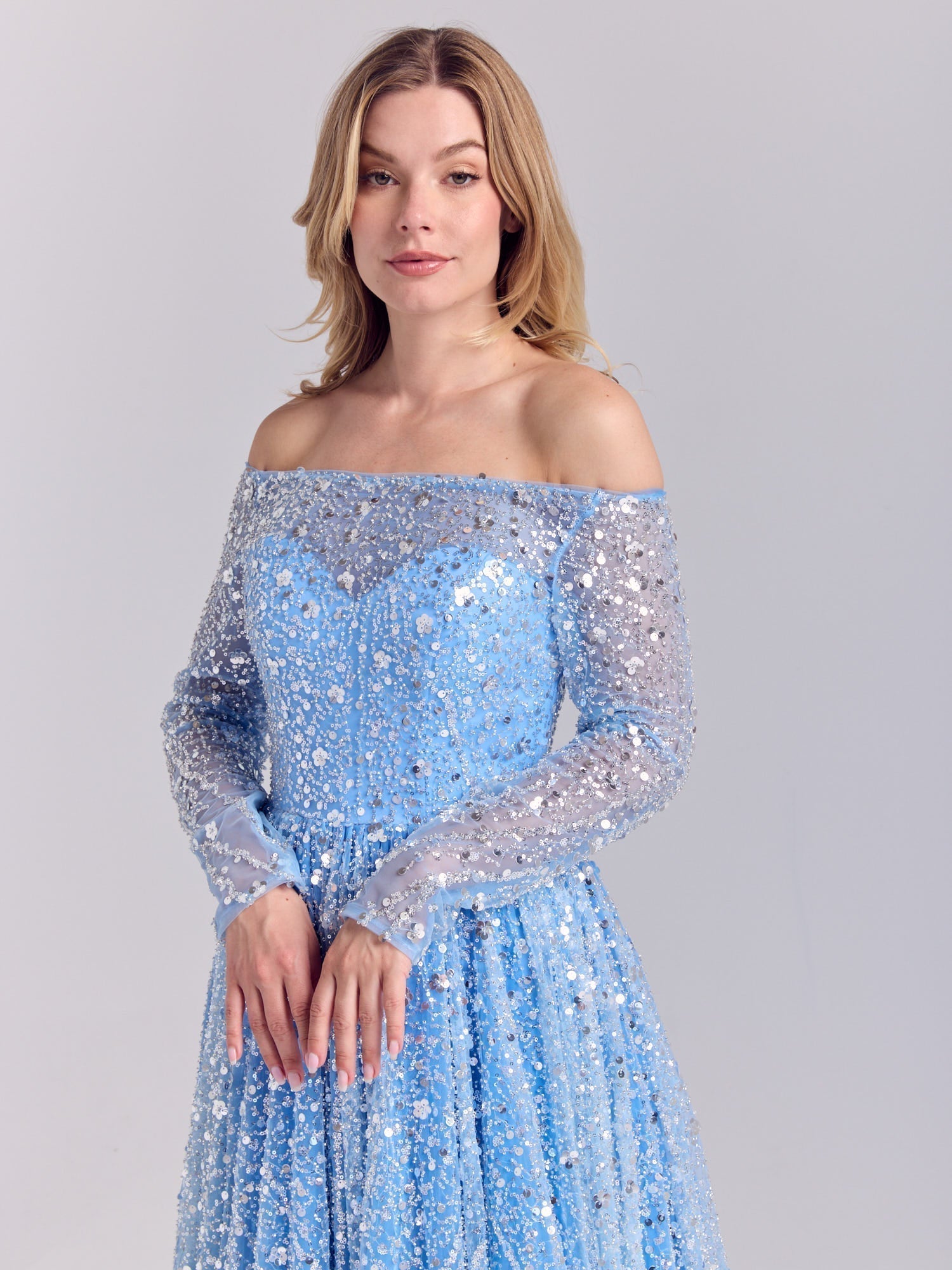 Blue off-the-shoulder sequin wedding dress with sheer sleeves by La Belle Élégance™