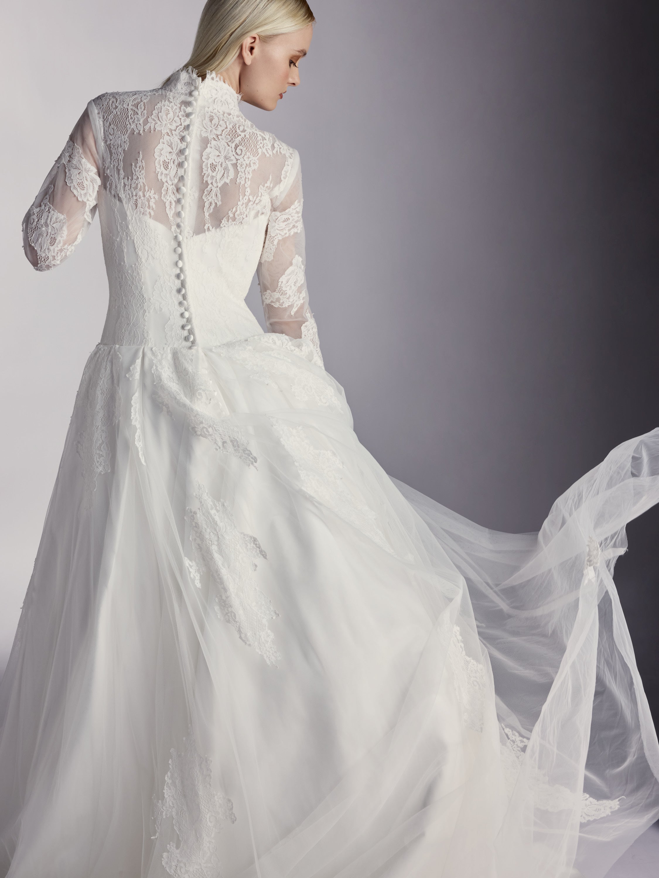 Éliane — Architectural lace gown grounded in satin